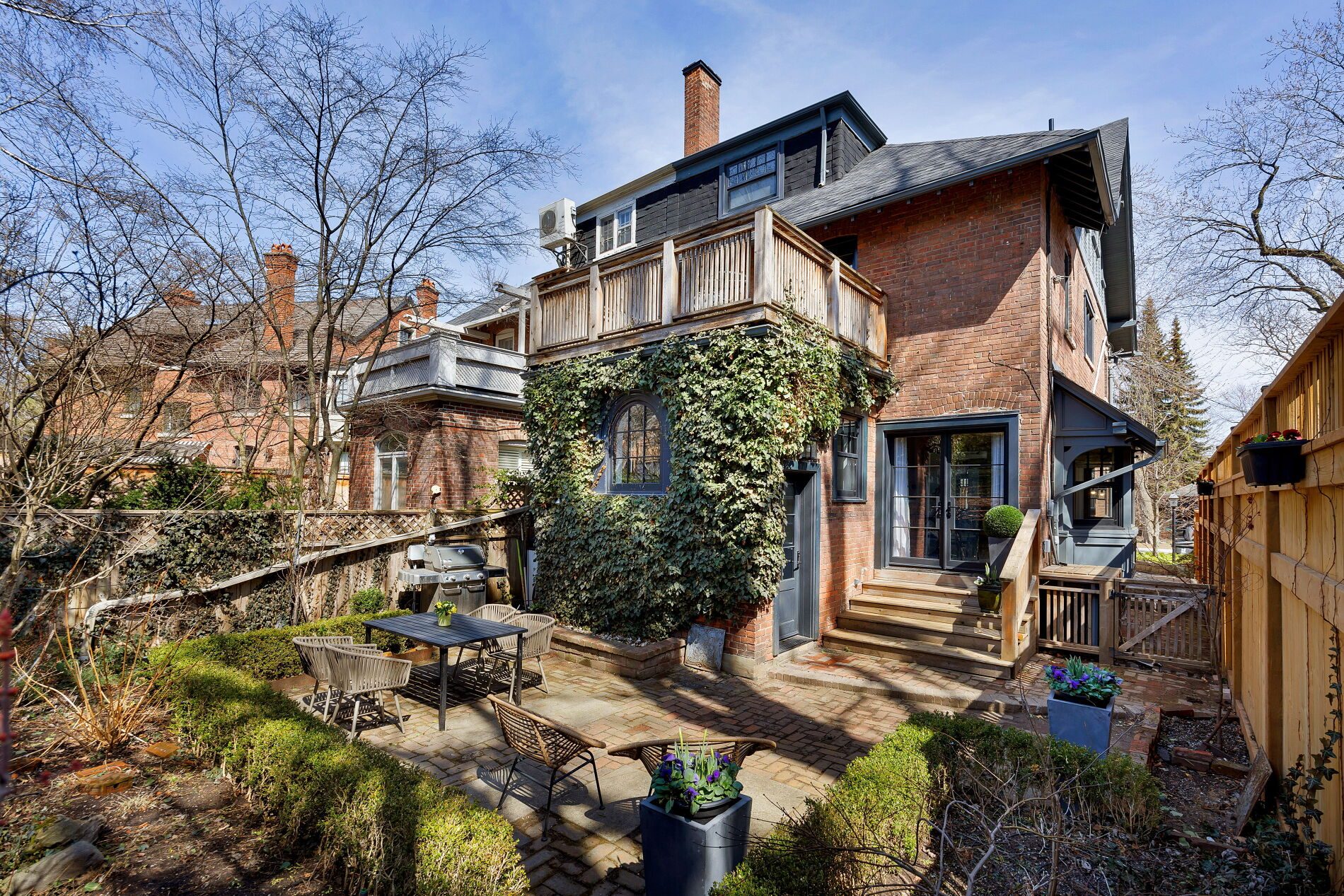 An ivy-covered Victorian semi-detached house